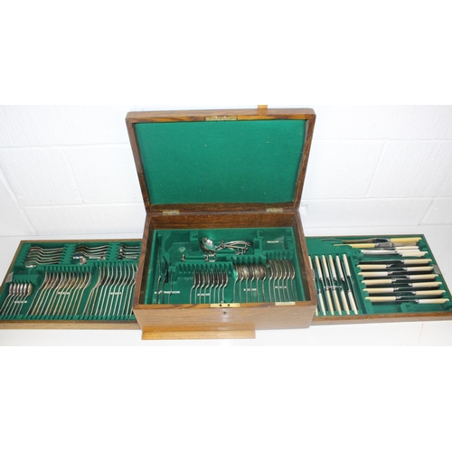 1107 - An early 20th century oak boxed cutlery set by Alexander Clark Co - a good percentage complete