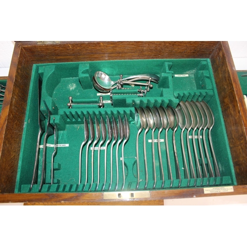 1107 - An early 20th century oak boxed cutlery set by Alexander Clark Co - a good percentage complete