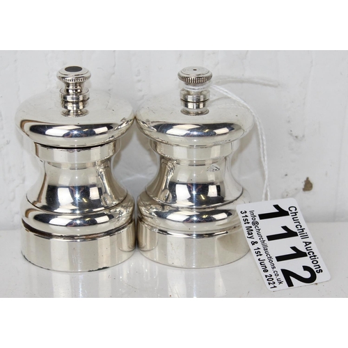 1112 - A pair of 20th century silver plated salt and pepper grinders