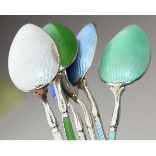 1113 - A set of 6 Art Deco period silver and enamel coffee spoons marked Sterling