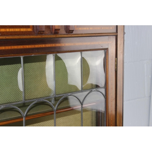 123 - An Edwardian Sheraton Revival glazed display cabinet with high-quality leaded glass