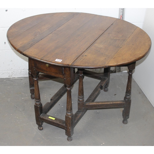 129 - 18th Century Oak drop-leaf table with drawer