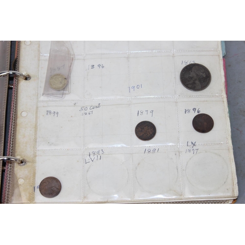 1300 - A folder of assorted coinage, mainly British to inc a qty of silver 3d coins and other silver coins