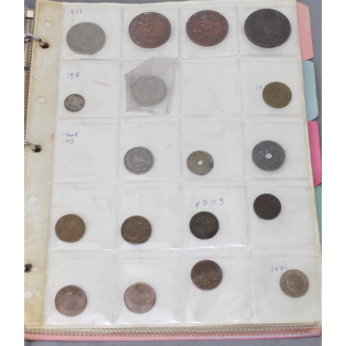 1300 - A folder of assorted coinage, mainly British to inc a qty of silver 3d coins and other silver coins