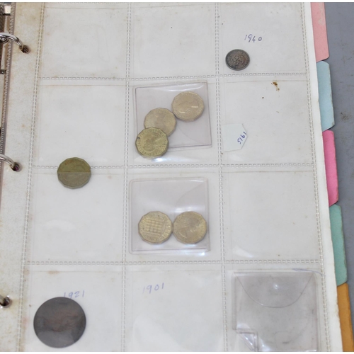 1300 - A folder of assorted coinage, mainly British to inc a qty of silver 3d coins and other silver coins