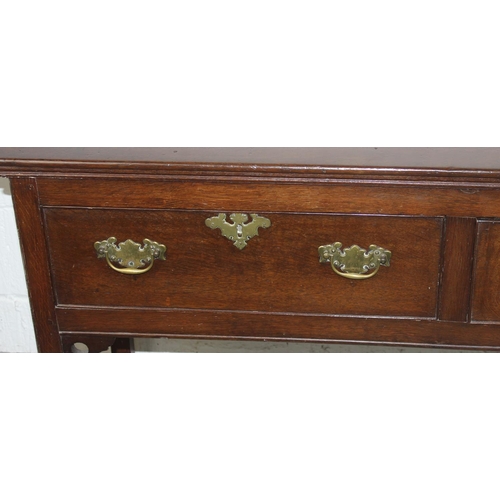 133 - A Georgian 3-drawer sideboard believed to be Elm with original brass handles