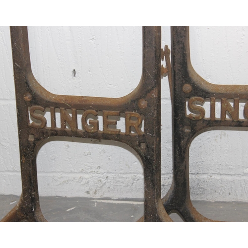 134 - A Vintage cast-iron Singer sewing machine base with marble top