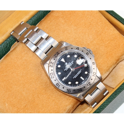 1354 - A Genuine Rolex Explorer II wristwatch with Stainless Steel case and band and black Swiss T<25 dial.... 