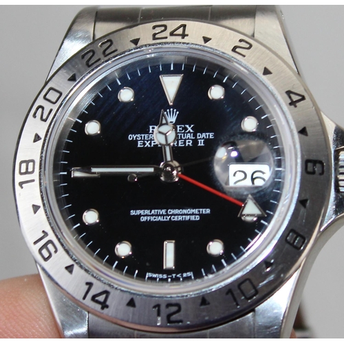 1354 - A Genuine Rolex Explorer II wristwatch with Stainless Steel case and band and black Swiss T<25 dial.... 