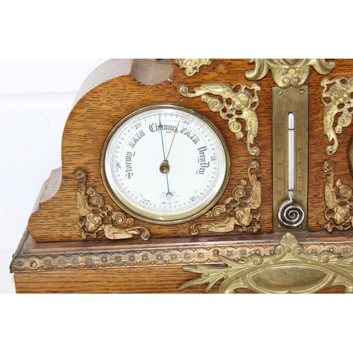 1355 - An impressive late 19th/ early 20th century Oak cased clock & barometer with Mercury thermometer and... 