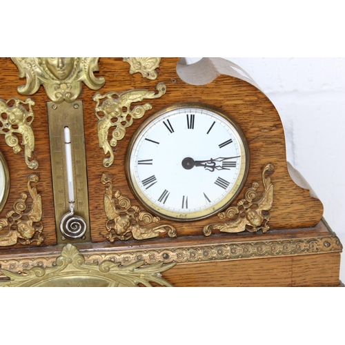 1355 - An impressive late 19th/ early 20th century Oak cased clock & barometer with Mercury thermometer and... 