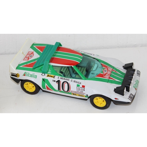 1411 - A Rare Joustra Lancia Stratos HF rally car tin plate friction toy car in original box