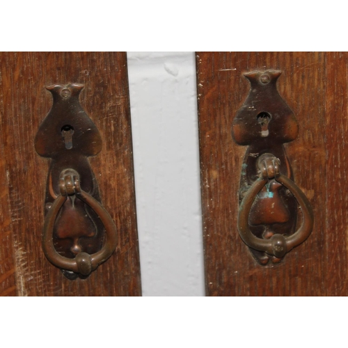 150 - Pair of Art Nouveau oak doors with enamel hearts in the manner of John Ruskin