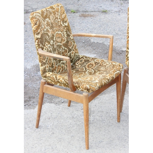 151 - A set of 6 retro chairs (2 carver and 4 dining) with 70's fabric