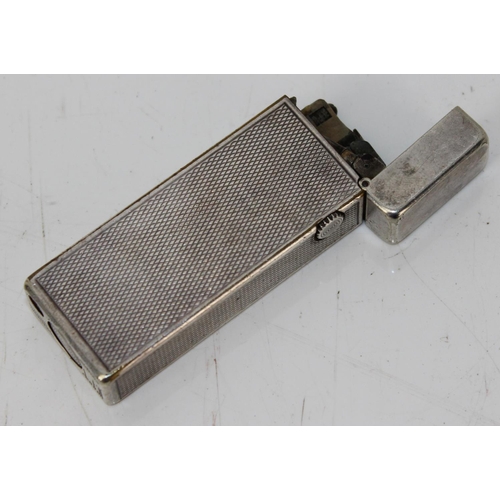 1614 - A silver plated Dunhill lighter - Patent 726982