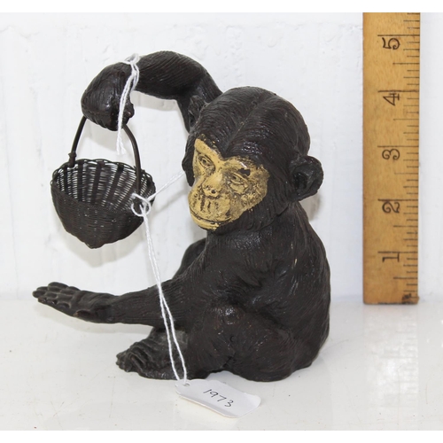 1619 - A 20th century cold painted bronze model of a chimp with basket