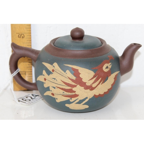 1624 - A 20th century Chinese Yixing teapot of 3 colours decorated with Dragon and Cockerel