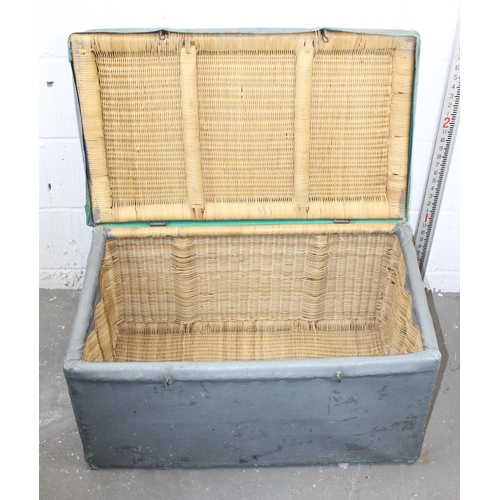 19 - A vintage Canvas covered wicker trunk