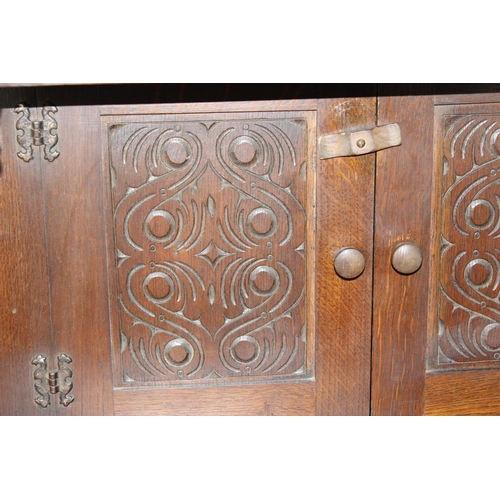 2 - A vintage miniature Jacobean style court cupboard with carved details