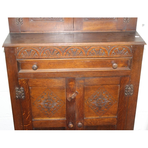 2 - A vintage miniature Jacobean style court cupboard with carved details