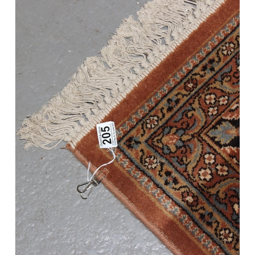 205 - A large modern Super Keshan Prado wool rug of beige ground with Arabesque decoration