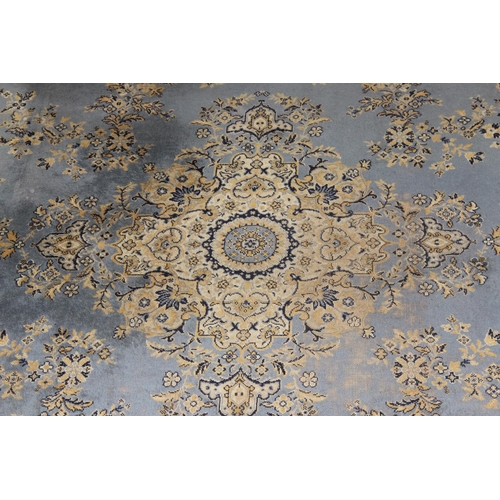 206 - A large modern blue ground rug