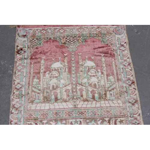 213 - A vintage Prayer rug decorated with mosque