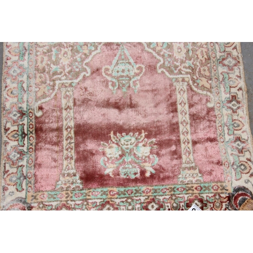 213 - A vintage Prayer rug decorated with mosque