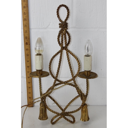 214 - A vintage double wall sconce in gilt metal in a rope twist design - later converted to electricity