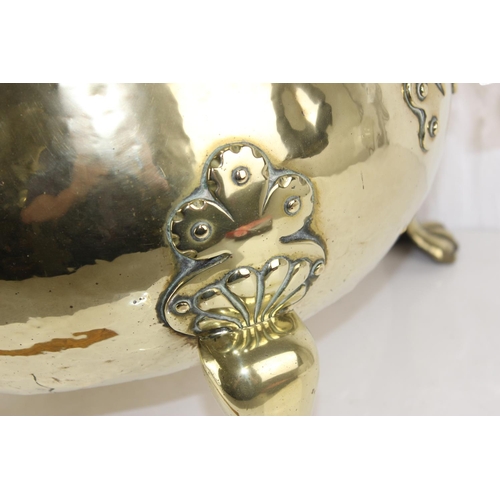 270 - Large and impressive 19th Century brass coal-bucket with lion-paw feet and decorative handles