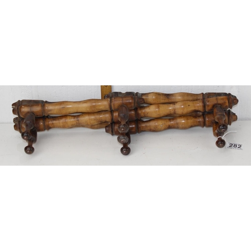 282 - A set of vintage carved wooden bamboo effect coat hooks