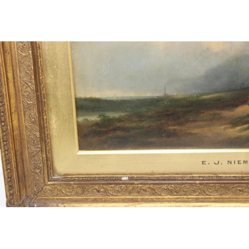 349 - E.J. Neimann (XIX) - Oil on canvas of figures on a path near a windmill. In original gilt frame