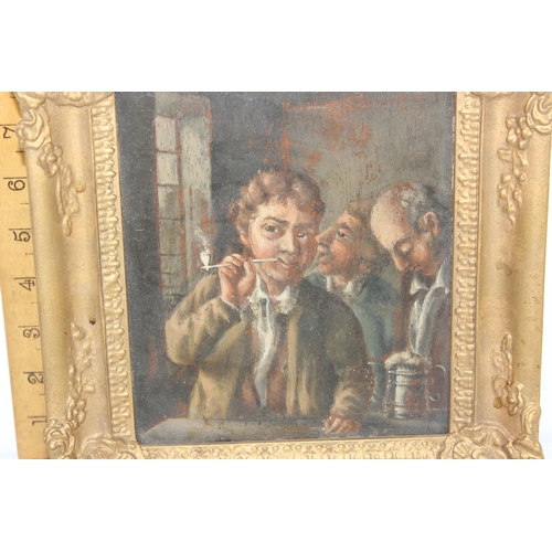 351 - A 19th century oil on board of a gentleman smoking a pipe in a tavern in gilt frame - unsigned