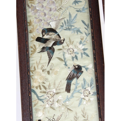 358 - A pair of framed antique/ vintage Japanese embroidery panels decorated with birds and flowers, belie... 