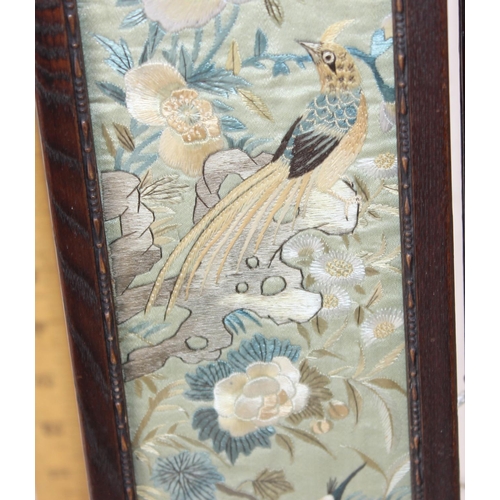 358 - A pair of framed antique/ vintage Japanese embroidery panels decorated with birds and flowers, belie... 