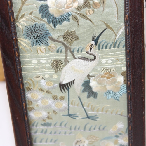 358 - A pair of framed antique/ vintage Japanese embroidery panels decorated with birds and flowers, belie... 