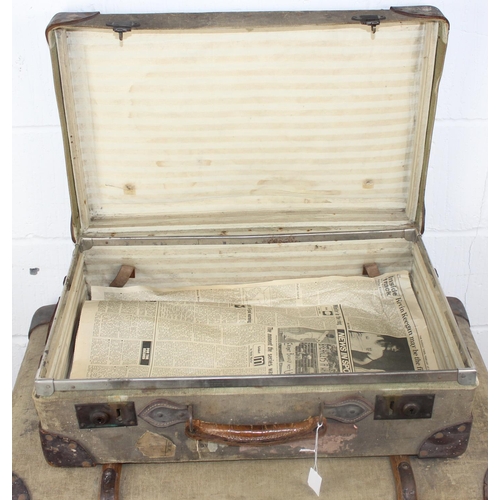 62 - A set of 3 matched travelling trunks/ suitcases marked 