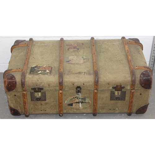 62 - A set of 3 matched travelling trunks/ suitcases marked 