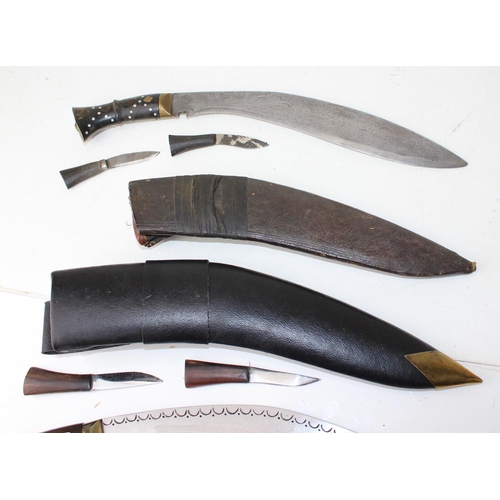 1030 - 2 20th century Kukri knives with sheaths