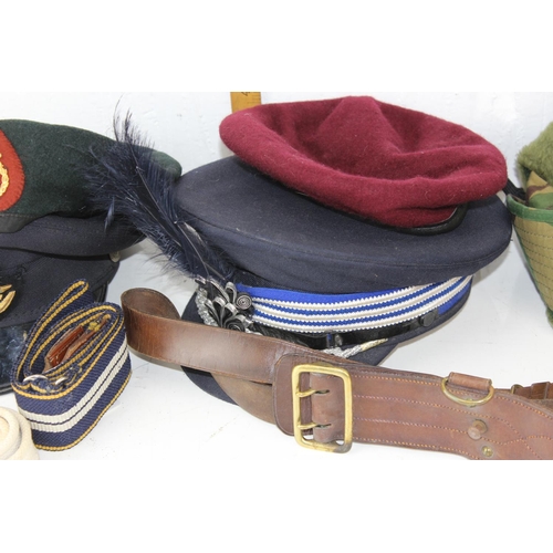 1031 - A qty of military and other caps and berets and a 1943 dated Hobson Sam Brown belt