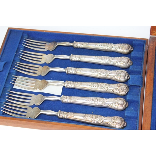 1135 - 2 boxed sets/ part sets of fish knives and forks in mahogany boxes, some silver handled