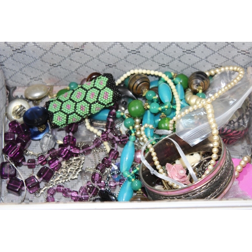 1213 - Aluminium vanity case full of vintage and modern costume jewellery to include necklaces, rings, eari... 