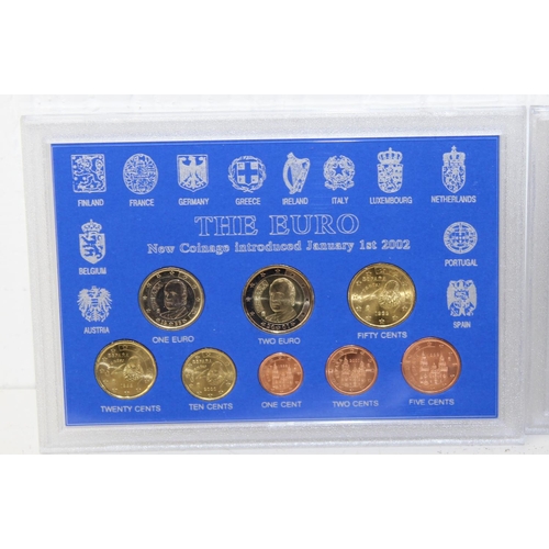 1349m - 3 boxed Euro coin sets -