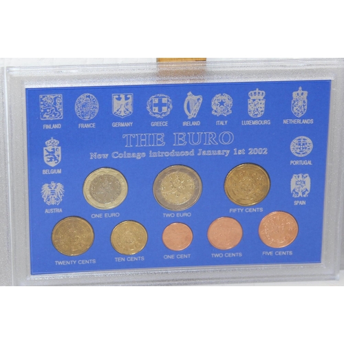 1349m - 3 boxed Euro coin sets -