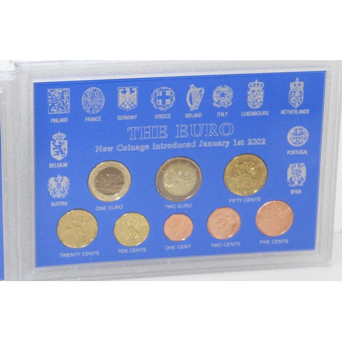 1349m - 3 boxed Euro coin sets -