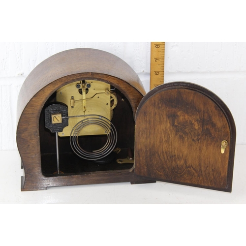 1375 - Art Deco period Oak cased mantle clock with key and pendulum