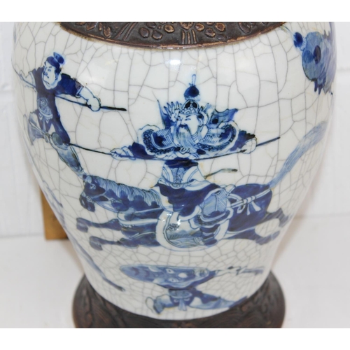 1634 - A 19th century Chinese blue & white baluster vase with crackle glaze and copper effect decoration - ... 