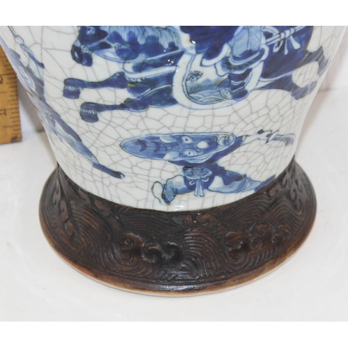 1634 - A 19th century Chinese blue & white baluster vase with crackle glaze and copper effect decoration - ... 