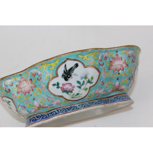 1639 - An unusual Chinese Canton enamelled porcelain bowl on turquoise ground and decorated with birds, sea... 