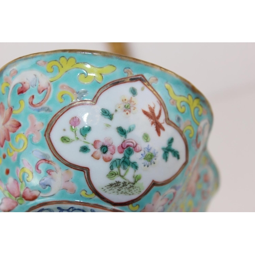 1639 - An unusual Chinese Canton enamelled porcelain bowl on turquoise ground and decorated with birds, sea... 